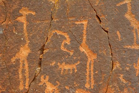 Petroglyphs or prehistoric art carved in wall in Southwest United Statesの写真素材