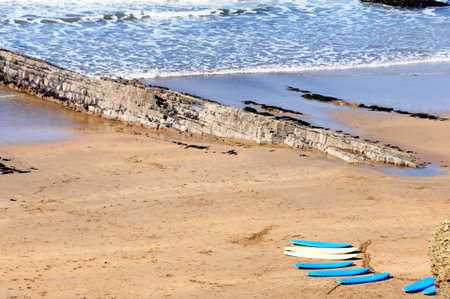 Surf boards on Cornish coast of Englandの写真素材