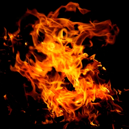 Fire flames on a black backgroundの写真素材