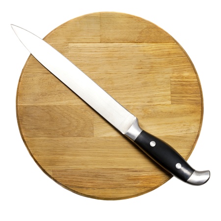 Large kitchen knife on a wooden boardの写真素材