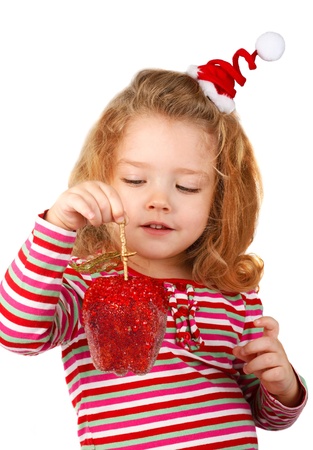 Little girl holding a red appleの写真素材