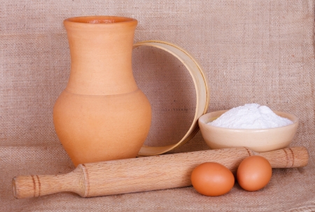 Flour, eggs and kitchen utensilの写真素材