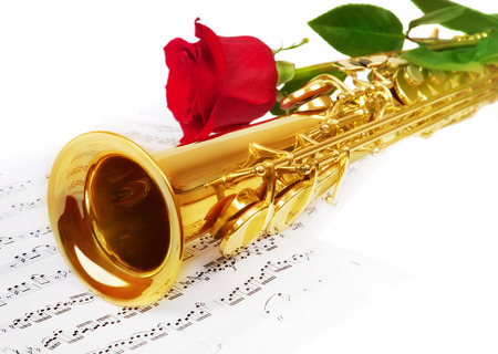 Musical notes and saxophone with flowerの写真素材