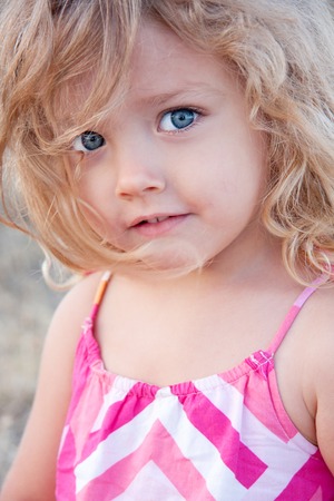 Summer portrait of a little girl outdoorの写真素材