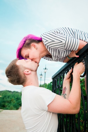Close up of a young couple visiting an parkの写真素材