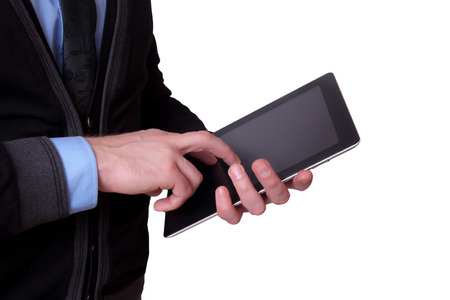 Businessman holding digital tablet, isolated on white backgroundの写真素材
