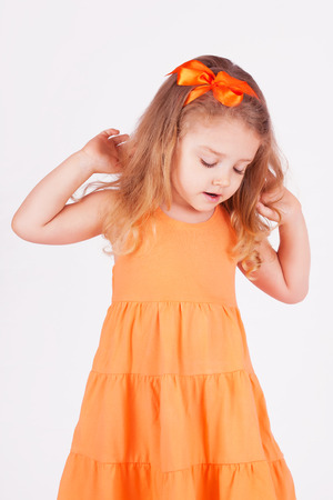 Portrait of a cute beautiful little girlの写真素材