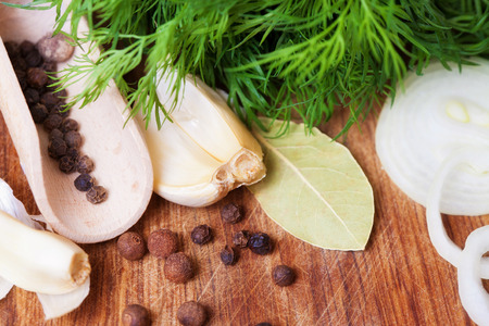 Aromatic herbs and spices on a table close-upの写真素材