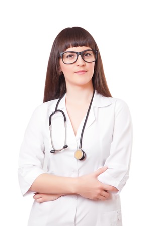 Woman   in a white lab coat and glasses, isolated on white backgroundの写真素材