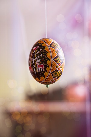 Colorful easter egg painted in folk styleの写真素材