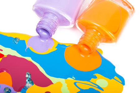 Spilled nail polish on a white backgroundの写真素材