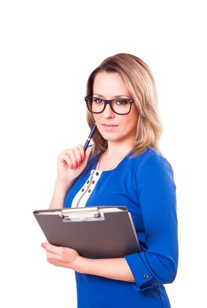 Portrait of a woman in glasses and with folder in her hands, isolated on white backgroundの写真素材