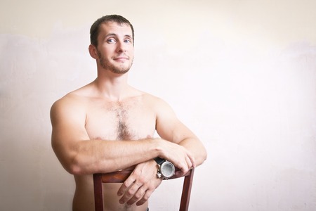 Portrait of happy smiling attractive man close up on a gray backgroundの写真素材