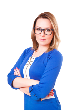 Portrait of a woman in glasses and blue dress, isolated on white backgroundの写真素材