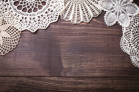 Vintage background with white crochet lace. Knitted frame for wedding and invitation. Background for valentines day or birthdayの写真素材