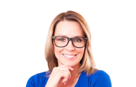 Portrait of pensive woman in glasses close-up isolated on white backgroundの写真素材