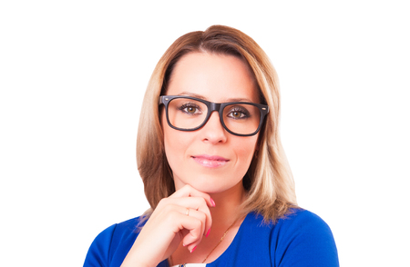 Portrait of pensive woman in glasses close-up isolated on white backgroundの写真素材