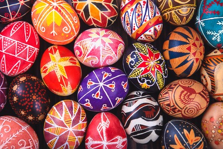 Mix of colored easter eggs with the traditional designs.の写真素材