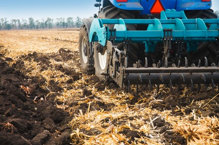 Agricultural machinery in the field. Cultivator close-up.の写真素材