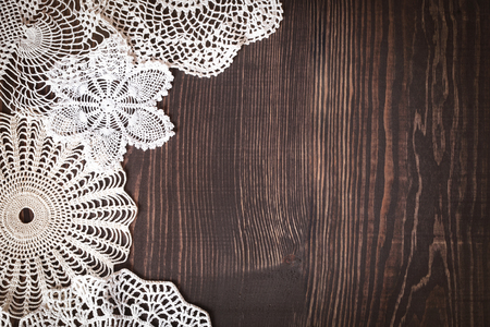 Vintage background with white crochet lace. Knitted frame for wedding and invitation. Background for valentines day or birthdayの写真素材