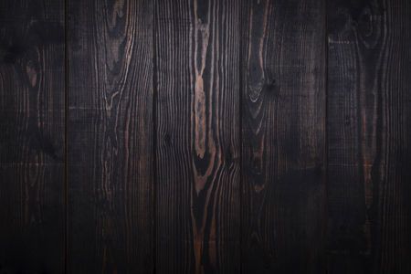 Old dark brown wooden plank background. Vintage and retro style.の写真素材
