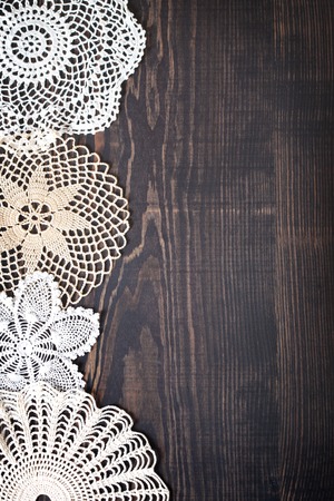 Vintage background with white crochet lace. Knitted frame for wedding and invitation. Background for valentines day or birthdayの写真素材