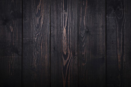 Old dark brown wooden plank background. Vintage and retro style.の写真素材