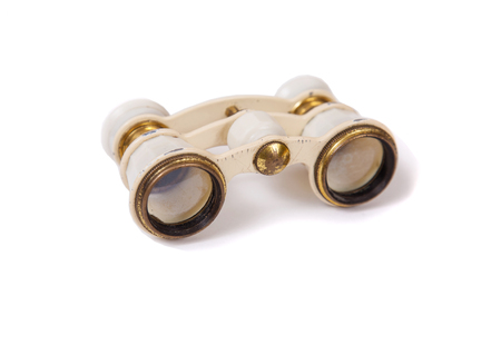Old opera glasses. Vintage white binoculars for the theater.の写真素材