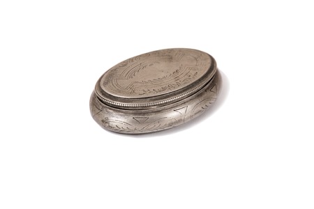 Vintage silver round box isolated on white background with shadow.の写真素材