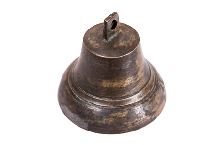 Ancient bell on a white background close-up.の写真素材