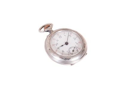 Retro pocket watch isolated over white background.の写真素材