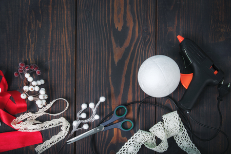 Making a toy for a Christmas tree. Handmade New Year decor. Copy space.の写真素材