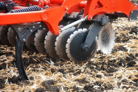 Agricultural plow close-up on the ground,agricultural machinery.の写真素材