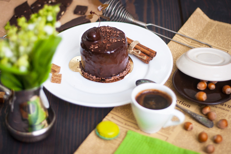 Chocolate brownie cake, dessert with nuts on dark background, on the breakfast table in the home kitchen.の写真素材