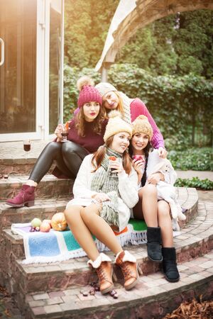 Women are best friends with fruit on a picnic in the countryside.の写真素材