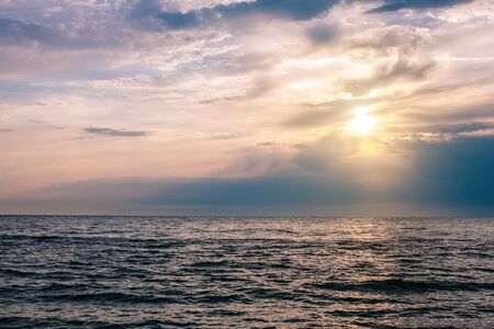 Panorama of beautiful sunset on the ocean. Morning at sea.の写真素材