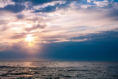Panorama of beautiful sunset on the ocean. Morning at sea.の写真素材