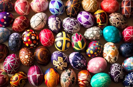Background with Easter hand-painted eggs in a folk style. Easter holiday.の写真素材