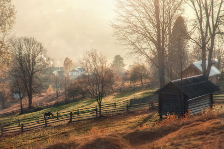 Beautiful picturesque landscape of a mountain village in the fall. Autumn in the mountains.