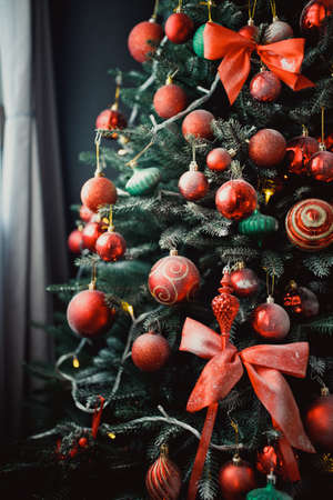 Christmas fir tree close-up, part of the festive interior.の写真素材