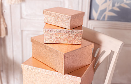 Gift boxes in a pile in the interior. Beautiful gift wrapping. High quality photoの写真素材