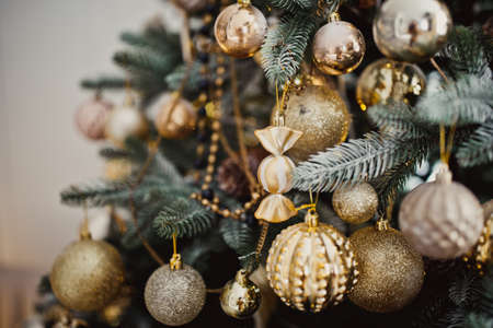 Christmas fir tree close-up, part of the festive interior.の写真素材