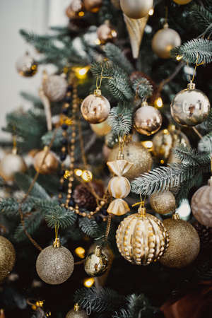 Christmas fir tree close-up, part of the festive interior.の写真素材