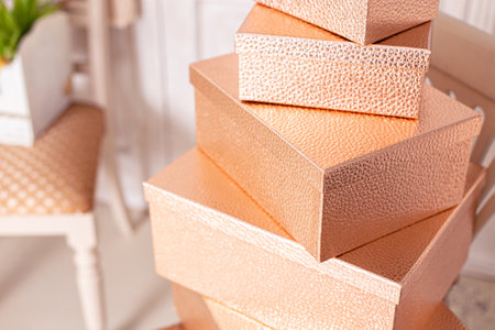 Gift boxes in a pile in the interior. Beautiful gift wrapping. High quality photoの写真素材