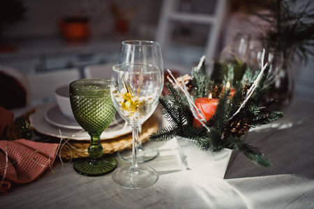 New Year's Christmas table, setting for a festive dinner. Home interior. Winter holidays.の写真素材