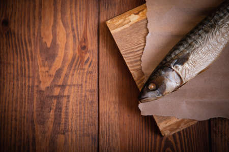 Hot smoked mackerel on the table in the kitchen.の写真素材