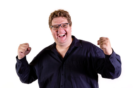 Caucasian man celebrating.