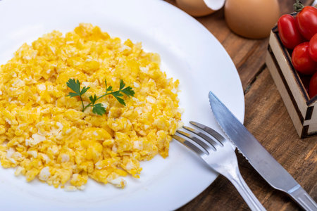 Scrambled eggs in metal pan