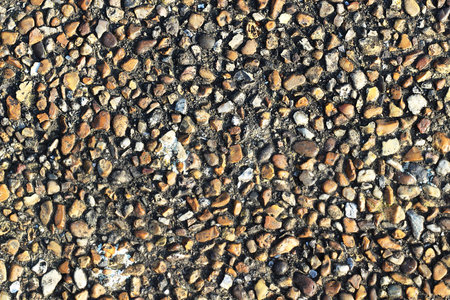 A texture of gravel on a gray background