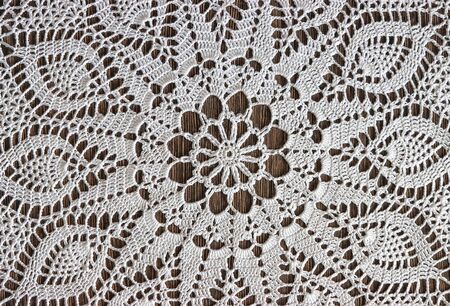 Napkin ornament made of knitted white threads.の写真素材